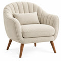 Fauteuil arrondi à dossier cannelé et pieds inclinés, beige