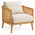 Fauteuil à panneaux latéraux tressés et coussins clairs, beige